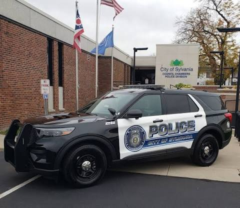 Sylvania Police vehicle parked outside City of Sylvania Council Chambers and Police Division